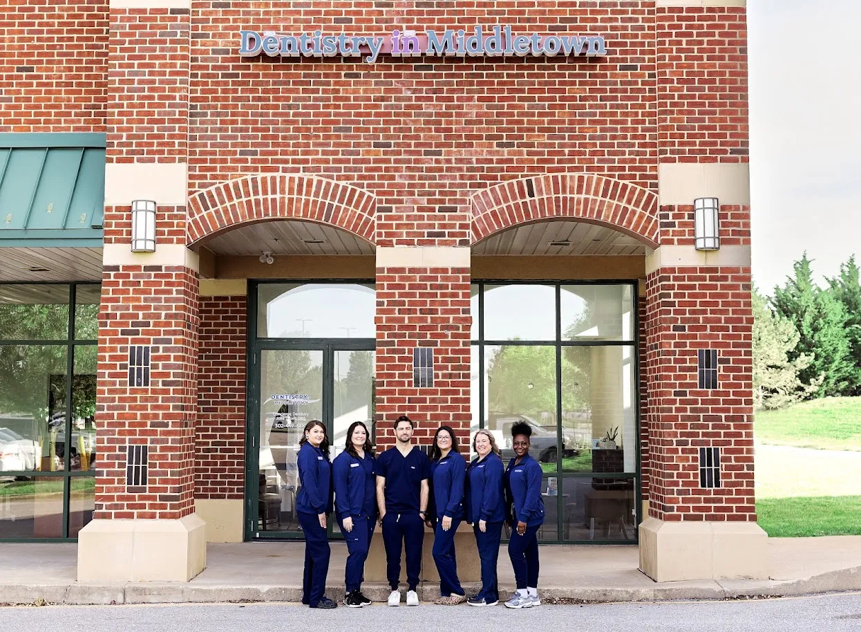 Dentistry in Middletown team smiling outside